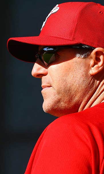 Price wins managerial debut, Reds top Indians 8-3